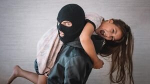 The kidnapper stole a teenage girls child concept of kidnapping terrorist and scared little hostage