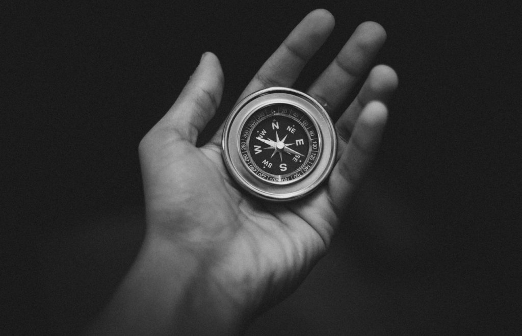 compass on someone's palm